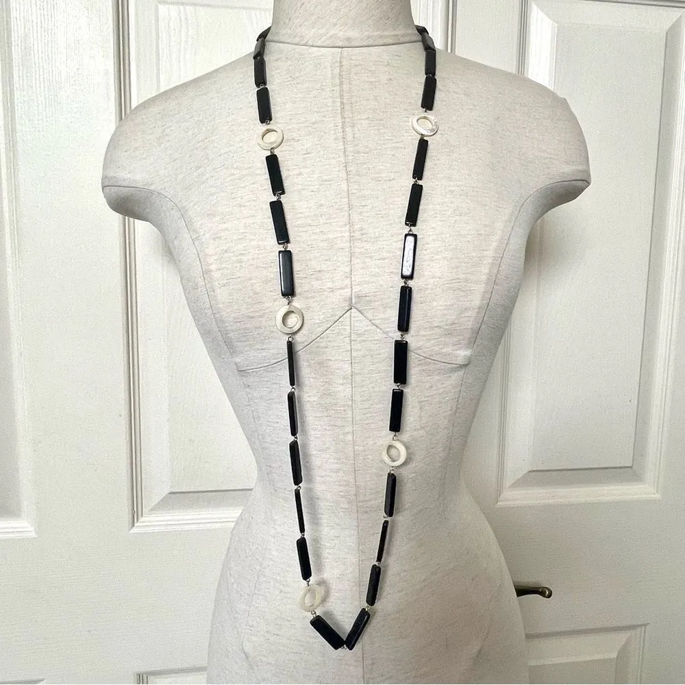 Long black beaded necklace with cream circle beads - Image 4