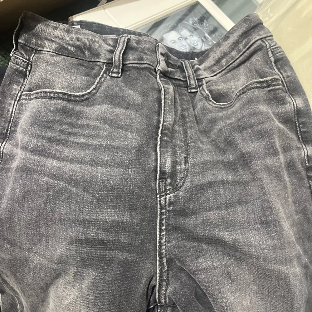 American Eagle Next Level Stretch grey black distressed skinny jeans raw hem - Image 8