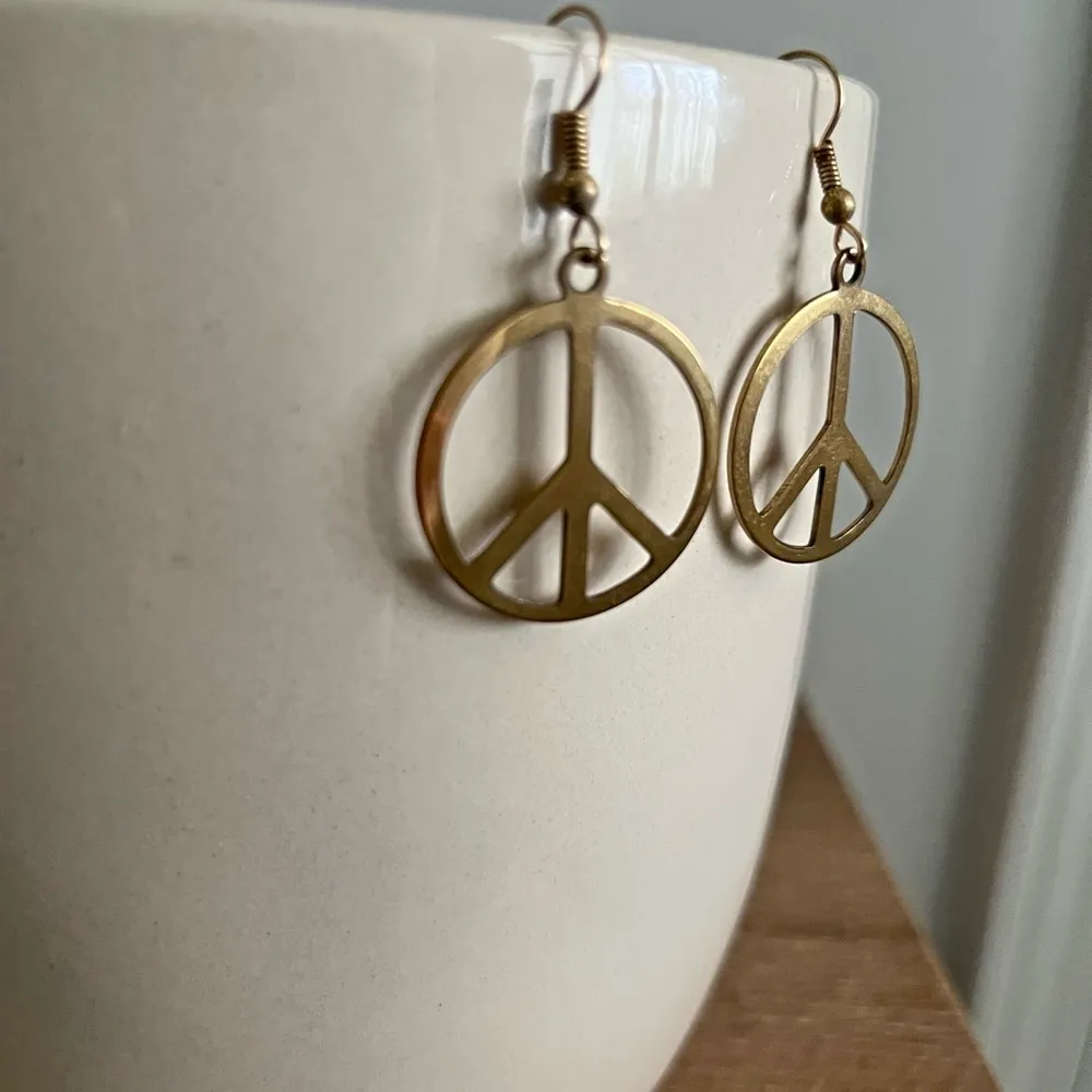 Vintage gold dangle peace earrings - Image 2