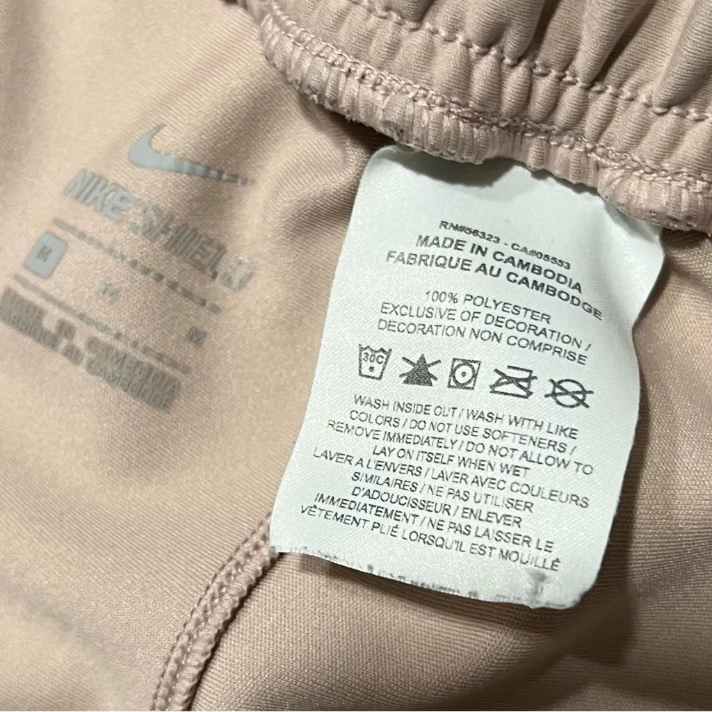 Nike Shield Running Division Light Pink Joggers medium reflective - Image 9