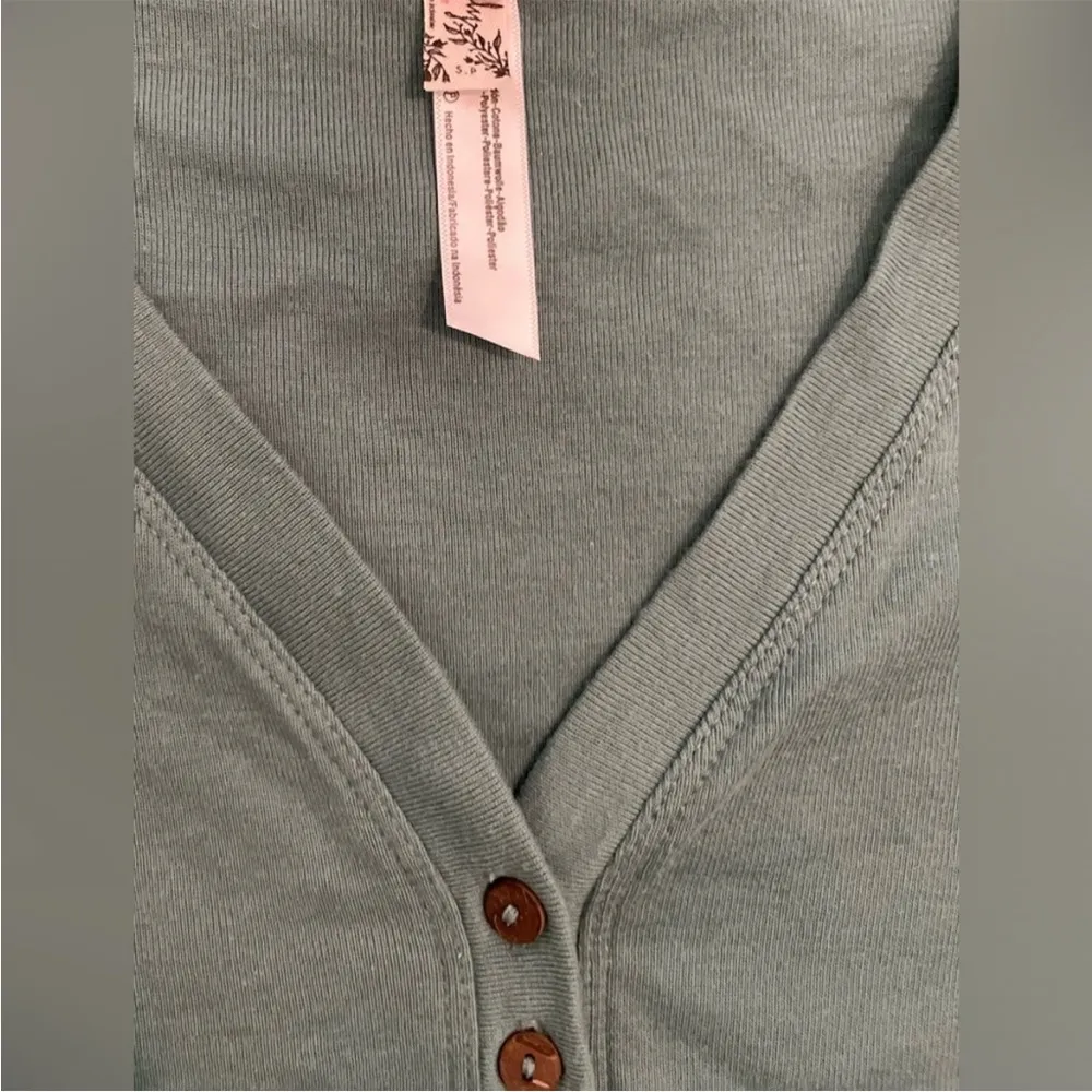 Free People Mia Tulip Sleeve Bodysuit Blue
Eucalyptus Henley Thong Bodysuit sz S - Image 16