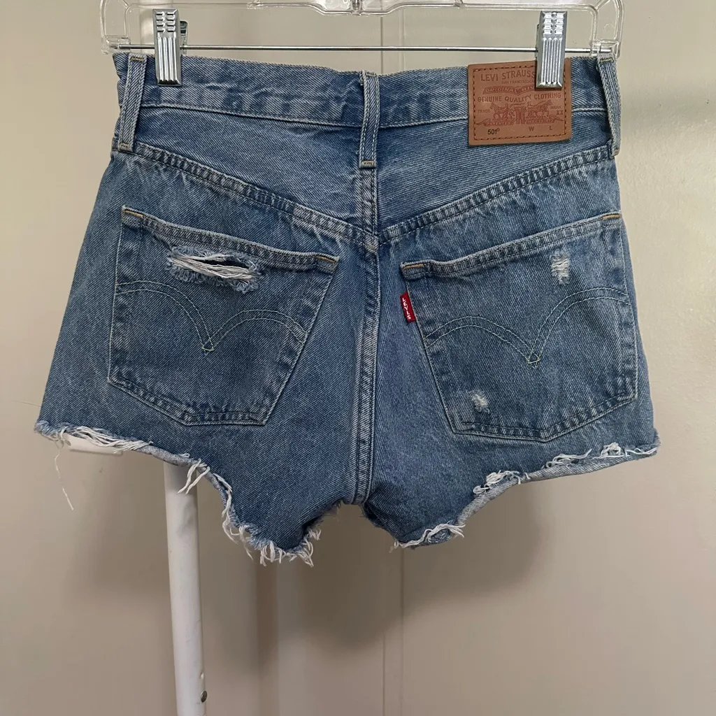 Levi’s Women’s 501 High Waisted Distressed Denim Shorts Medium Wash 28” waist - Image 4
