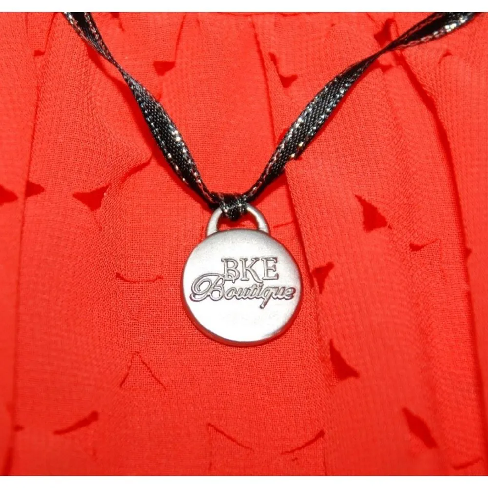 BKE Boutique Ladies Orange Batwing Blouse Top Size M L Cutout Geometric Pattern - Image 9