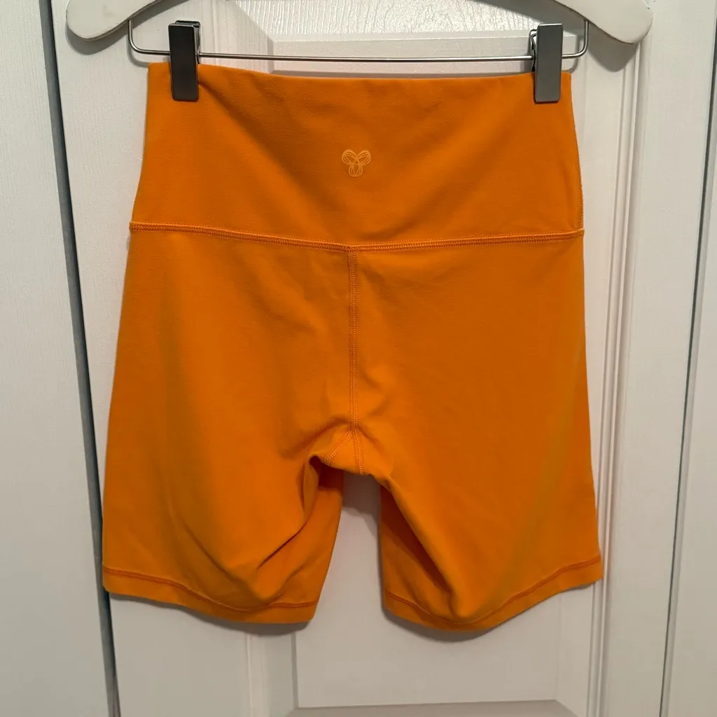 Aritzia TnAction 7” Orange Bike Shorts - Image 3