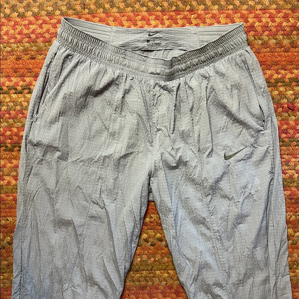 NIKE BLUE TEXTURED LIGHT WEIGHT PULL ON JOGGER PANTS - Image 3