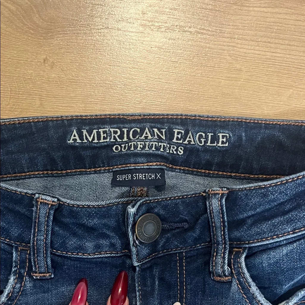 American Eagle Outfitters Women's Ripped Dark Blue Skinny Jeans - Image 6