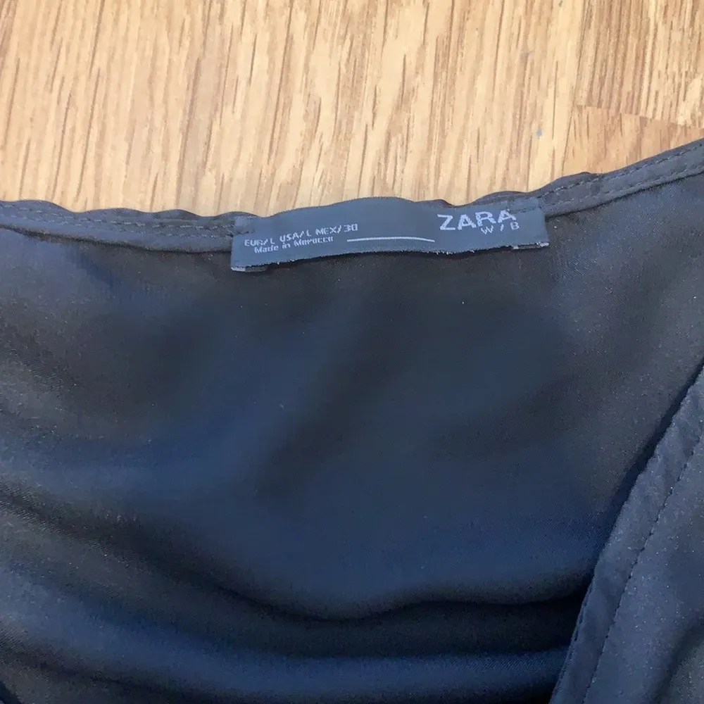 Feather top from Zara no feathers on the back of the shirt - Image 6