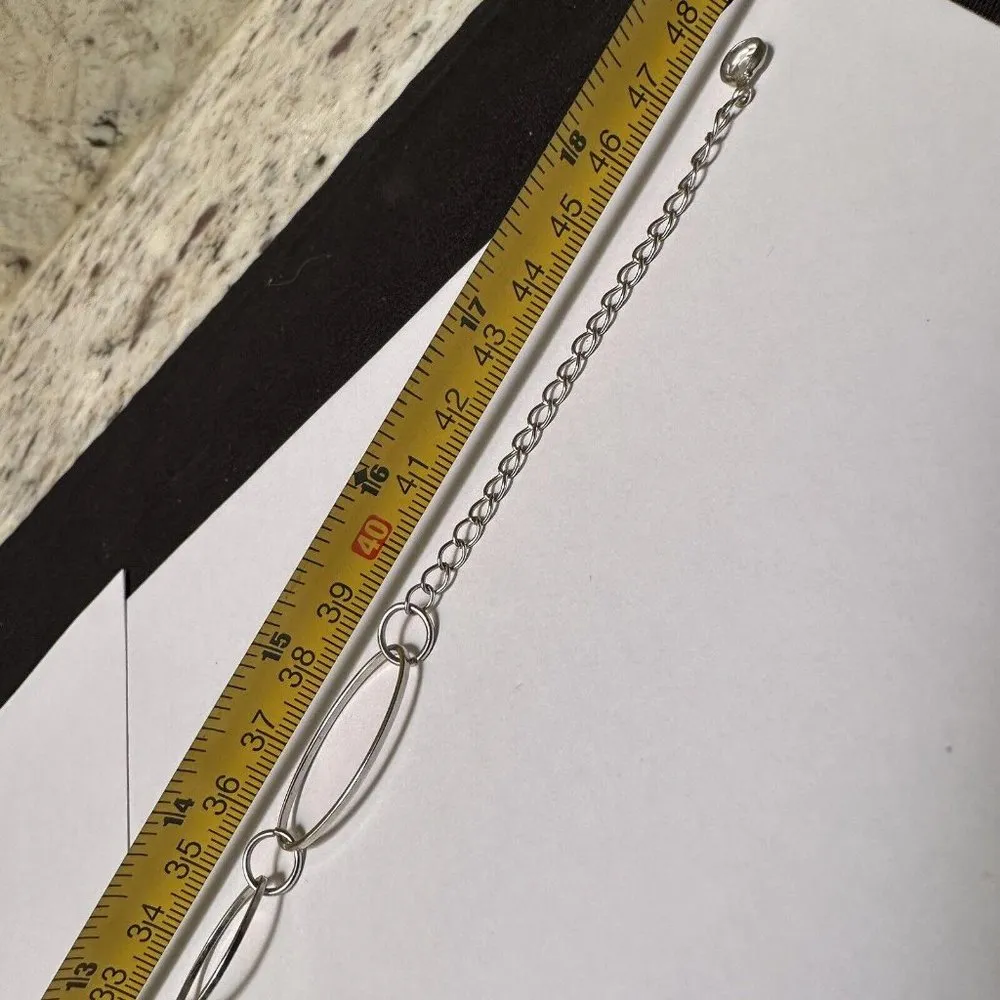 Signed Daisy Fuentes Silver Tone Layered Necklace With Rhinestone Loop - Image 8