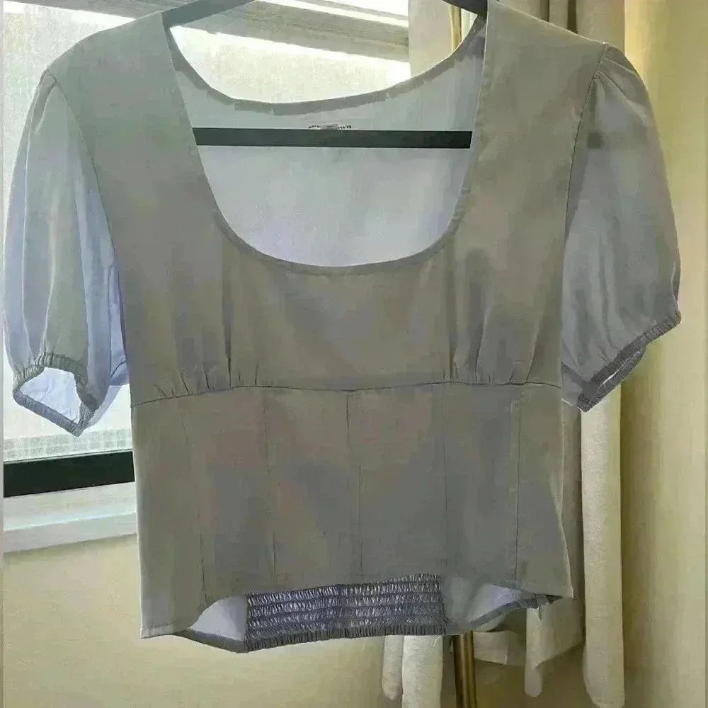 Light blue revolve superdown top - Image 7