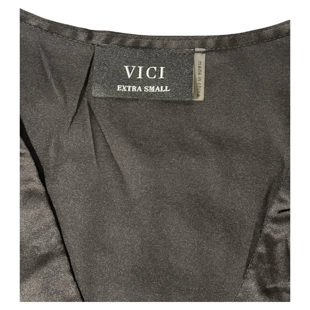 Vici Black Bodysuit with Elegant V-Neck Design - Image 2