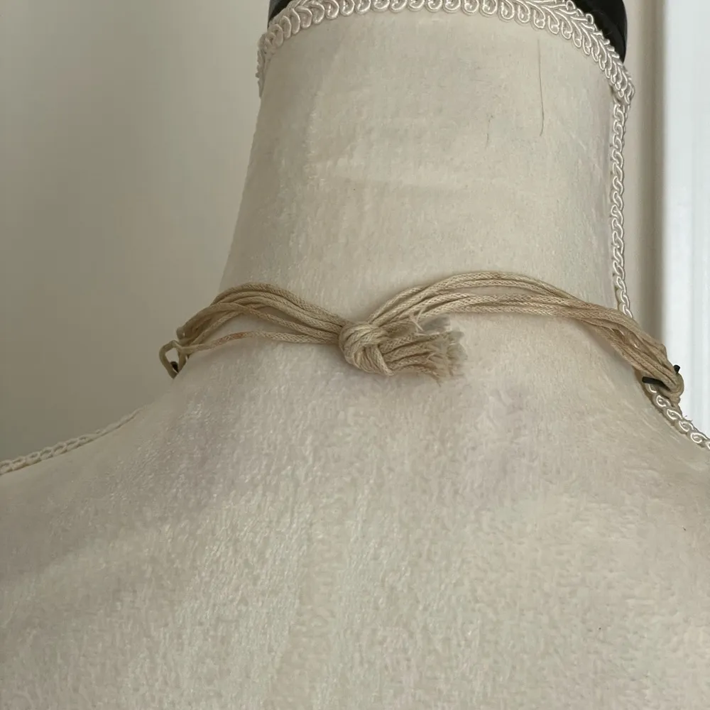 Woven medallion cord beach necklace with wooden beads accents sea horse pendant. - Image 4