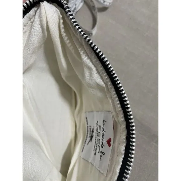 Feed UNICEF wristlet, Cosmetic Bag, Pencil Case By Nest Artisans In Guatemala - Image 4