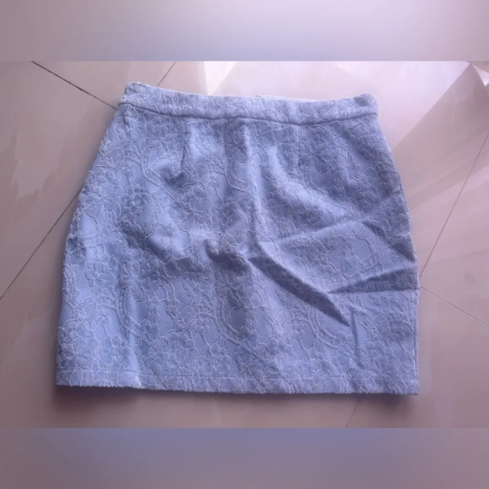 Baby blue lace mini skirt with a flattering y2kfashion #miniskirt Naked wardrobe - Image 10
