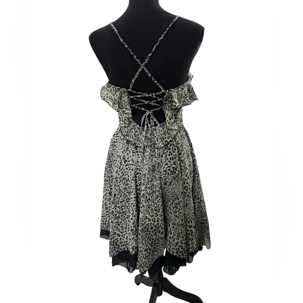 Beautiful animal print dress, with a back neckline marked by a bow Black - Image 2
