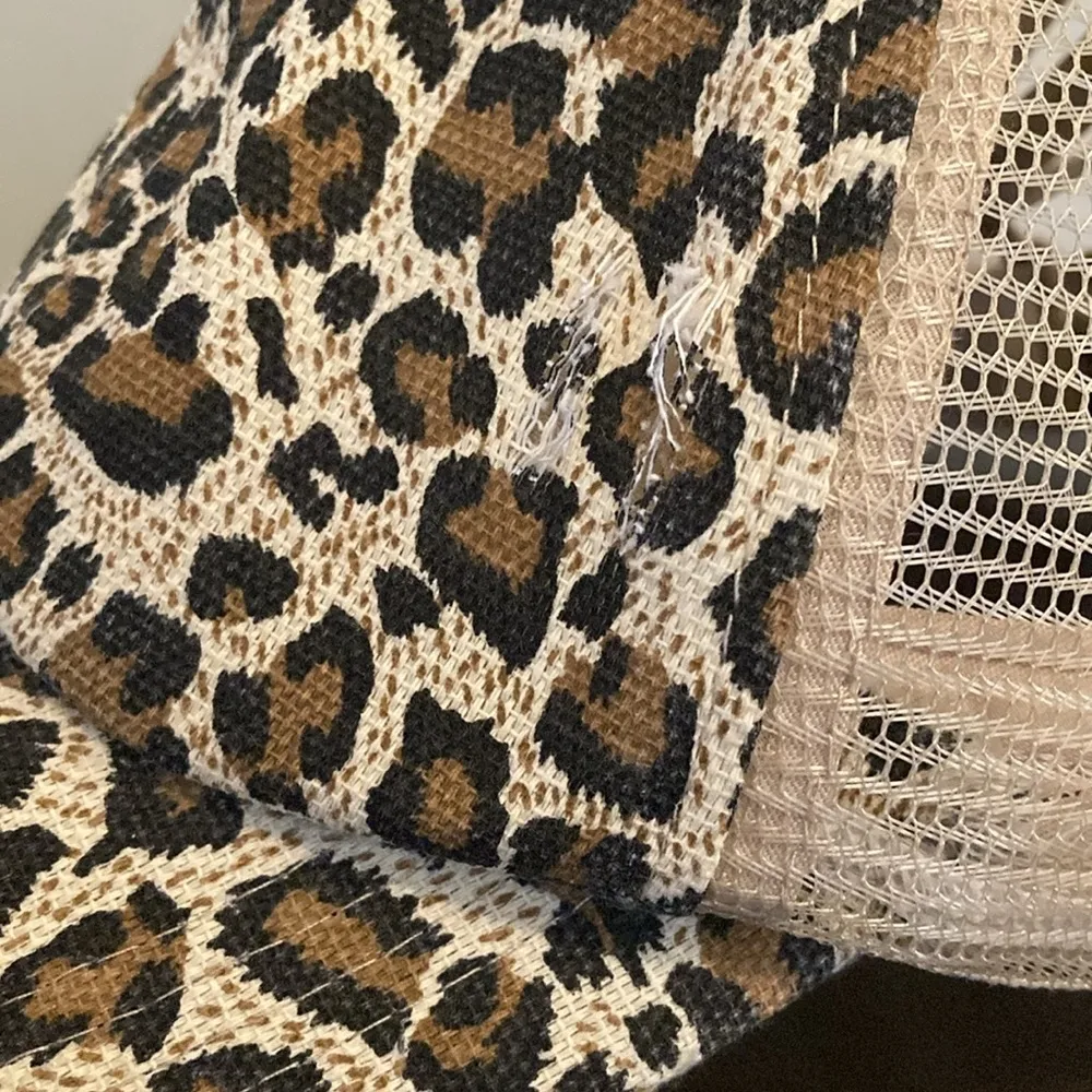 Charming Charlie’s Criss Cross Leopard Ponytail Trucker Hat - Image 4