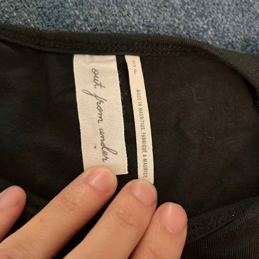 Out from under slashed shirt - Image 2