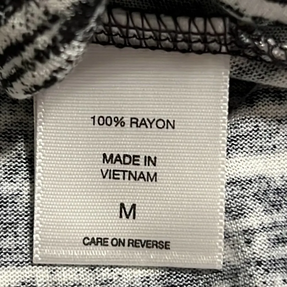 NY&C women’s size medium tank shark bite hem split sides black and white design - Image 8