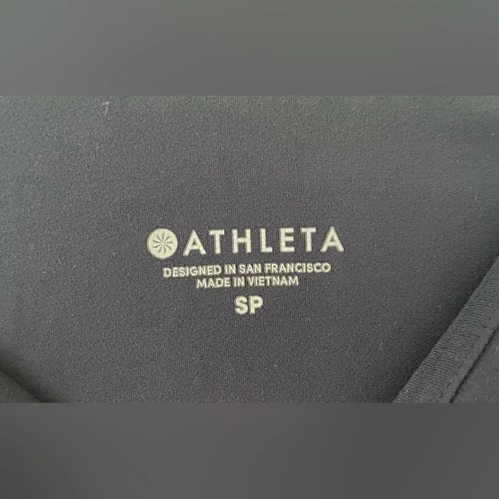 Athleta nylon / spandex navy blue flare leggings, ankle slit, elastic sides; S - Image 4