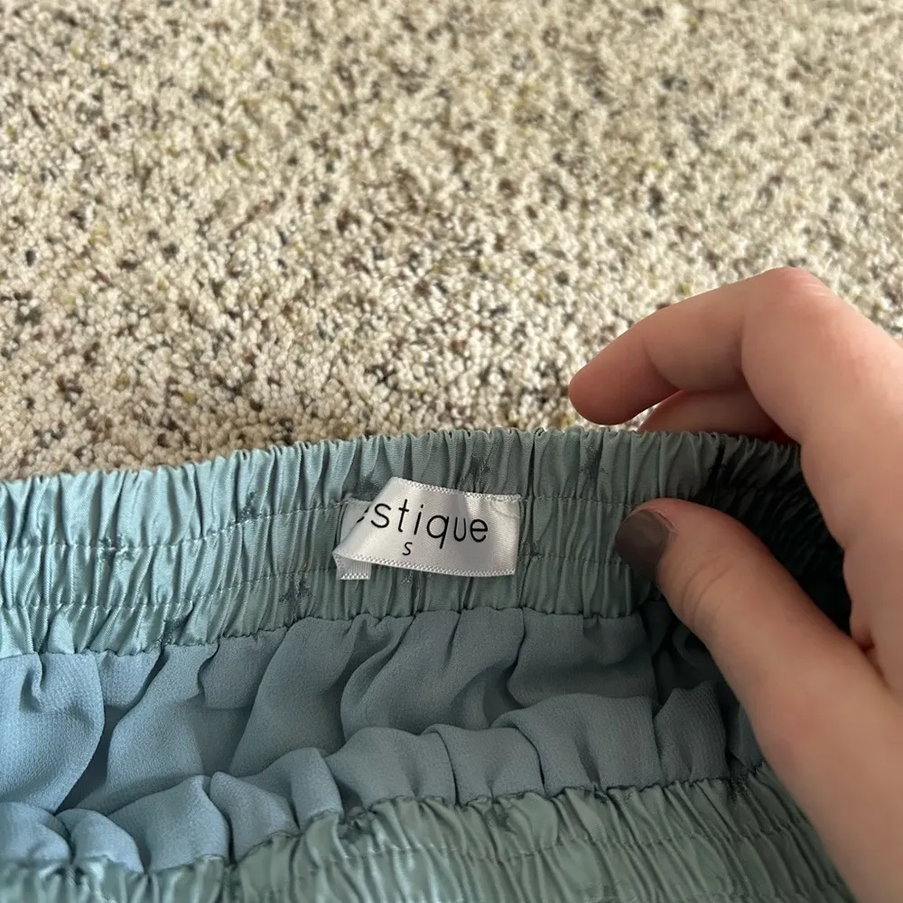 Vestique Green Bubble Mini Skirt with Smocked Ruffles - Image 2