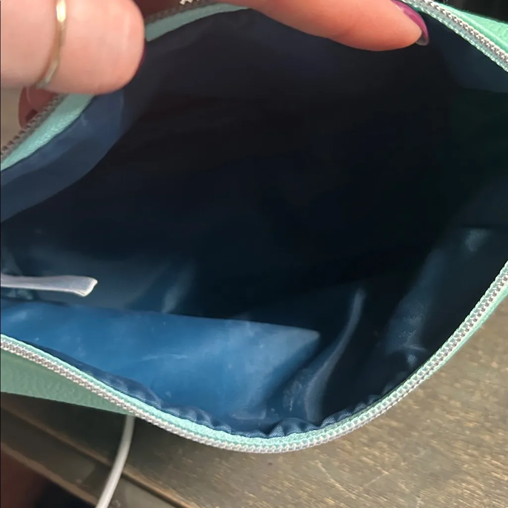 Elemis x Gretchen Roehrs faux leather makeup pouch in a mint green color. - Image 4