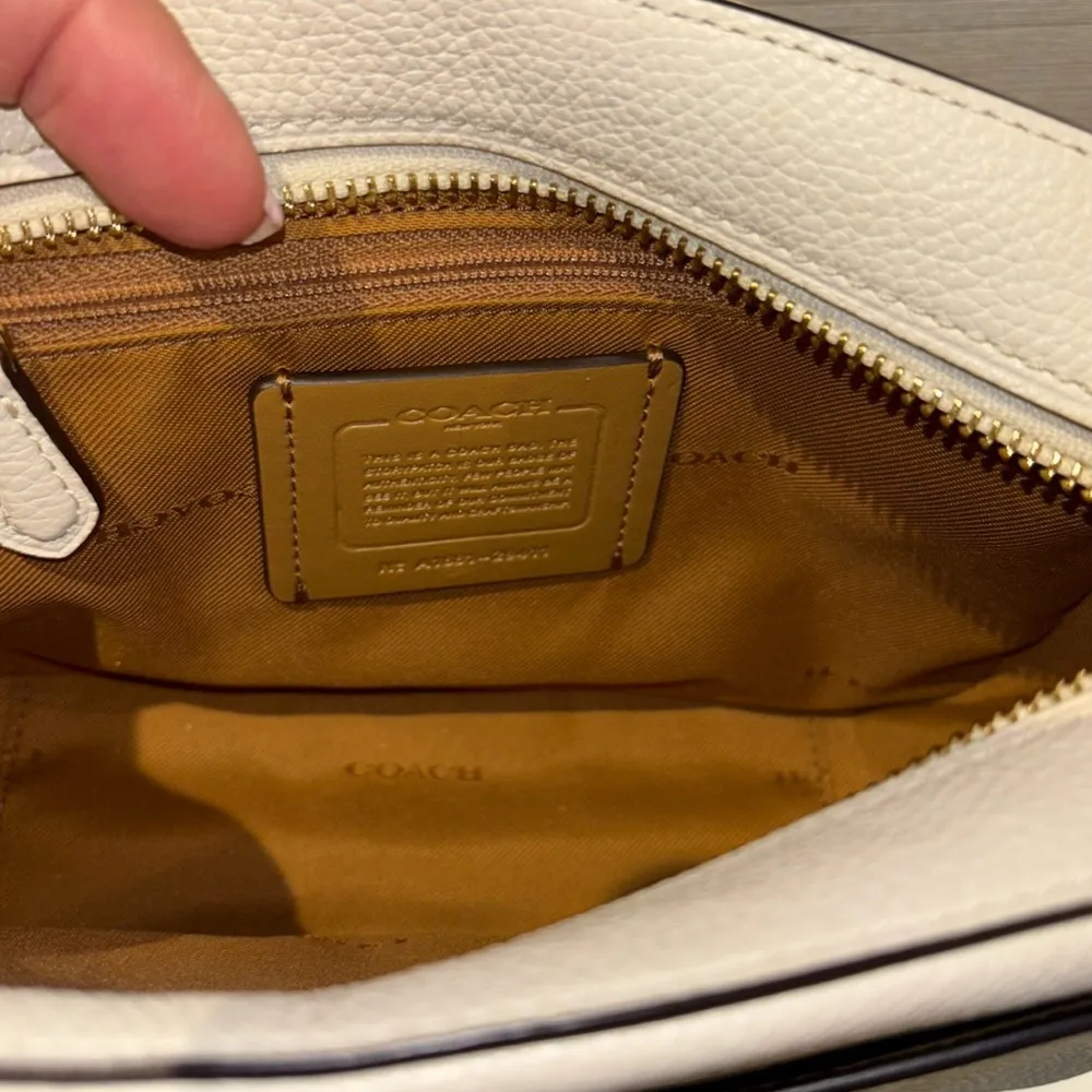 CROSSBODY LEATHER IS OFF WHITE/BONE COLOR GOLD HARDWARE ZIP CLOSURE ON TOP - Image 3