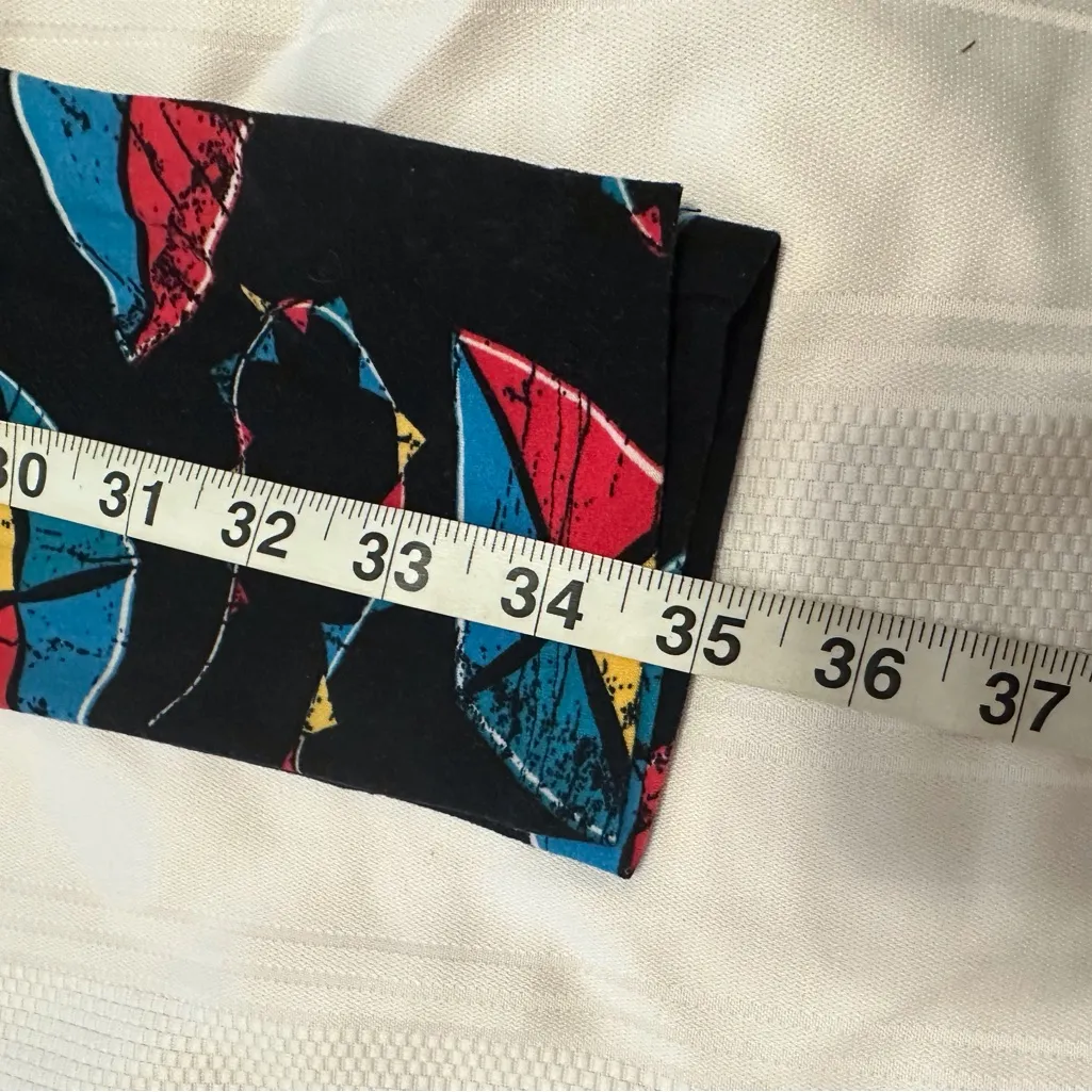 LuLaRoe women Leggings with Kite Design in Black, Red, Yellow, and Blue - Image 6