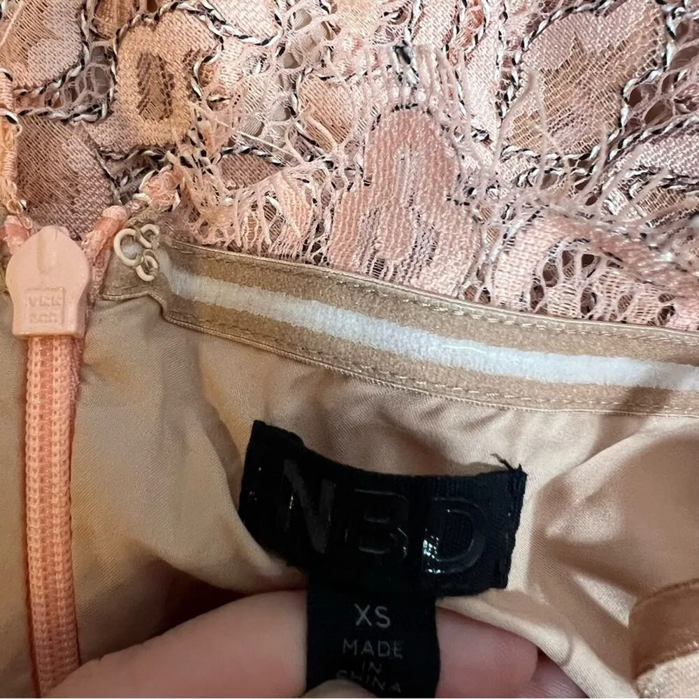 NBD Revolve Secrets Revealed Lace
Asymmetrical Romper in Dusty Rose Sz XS - Image 7