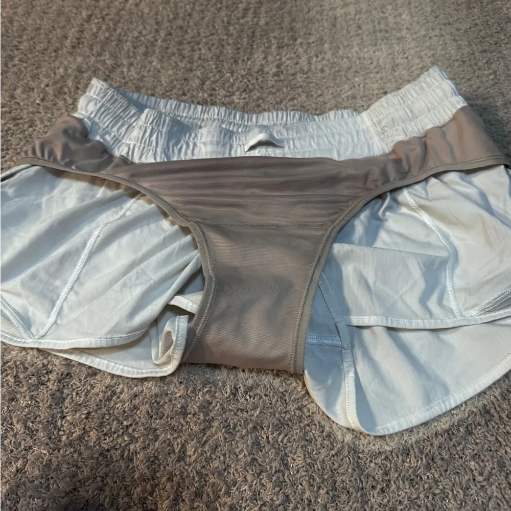 Lululemon hotty hot shorts like new sold out online! Size 10 light gray - Image 10