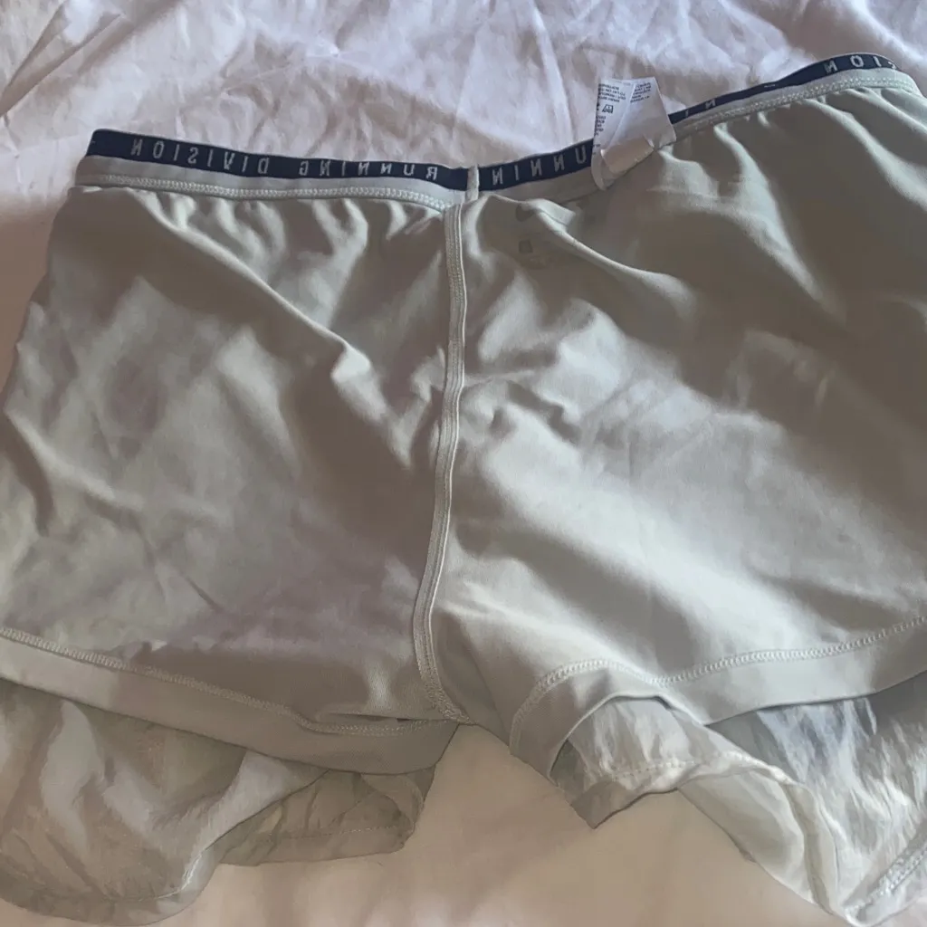 Nike Women's Light Gray Shorts with black Swoosh - Image 8