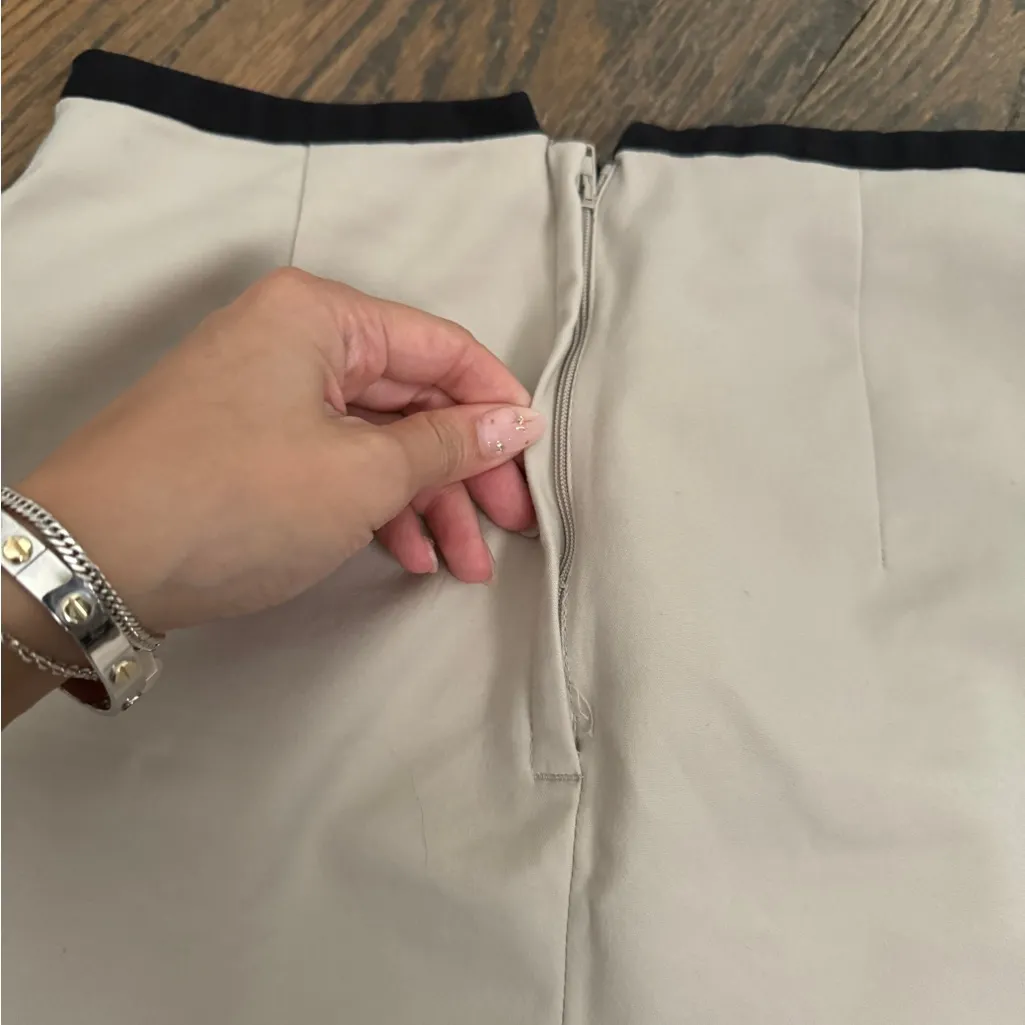 H&M khaki tan high waisted tailored mini skirt with black waist lining detail - Image 8