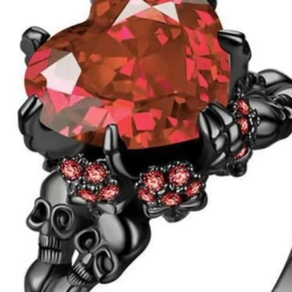 Super cool black band ring with red heart center and skulls on side! New - Image 3