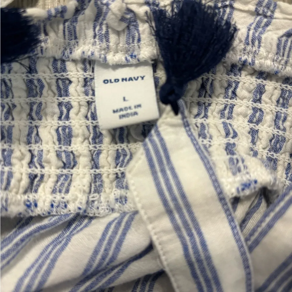 Blue and white striped tank top with adjustable straps and tie-up detail - Image 4