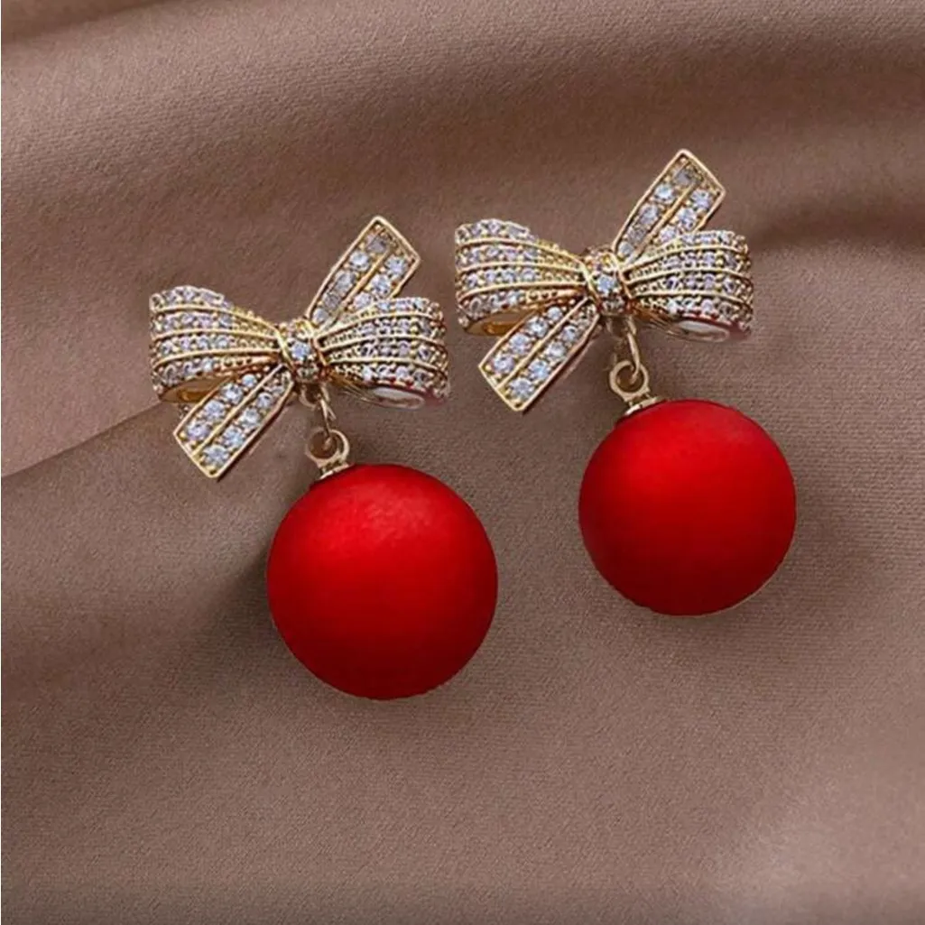 Red and Gold Bow Ornament Earrings - Image 2