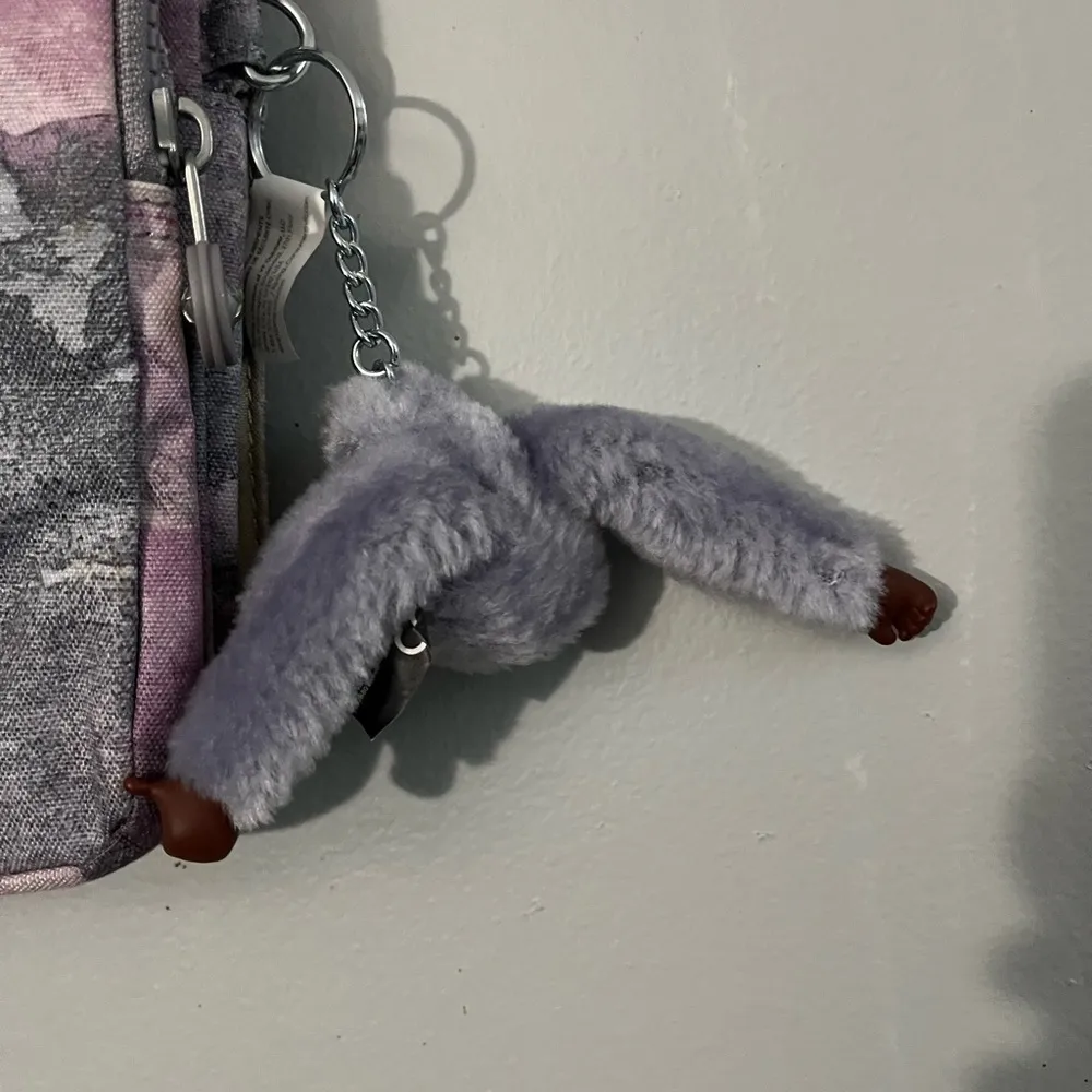 Kipling Eldorado Crossbody purple marble with monkey Melanie - Image 6