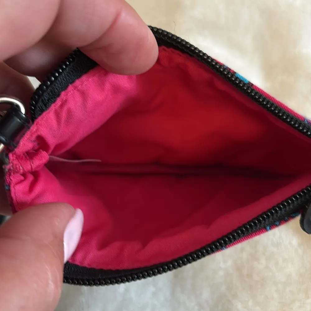 PINK AND BLUE FLORAL DESIGN WRISTLET WITH SOME BEADS ON ONE SIDE AND BLACK STRAP - Image 6