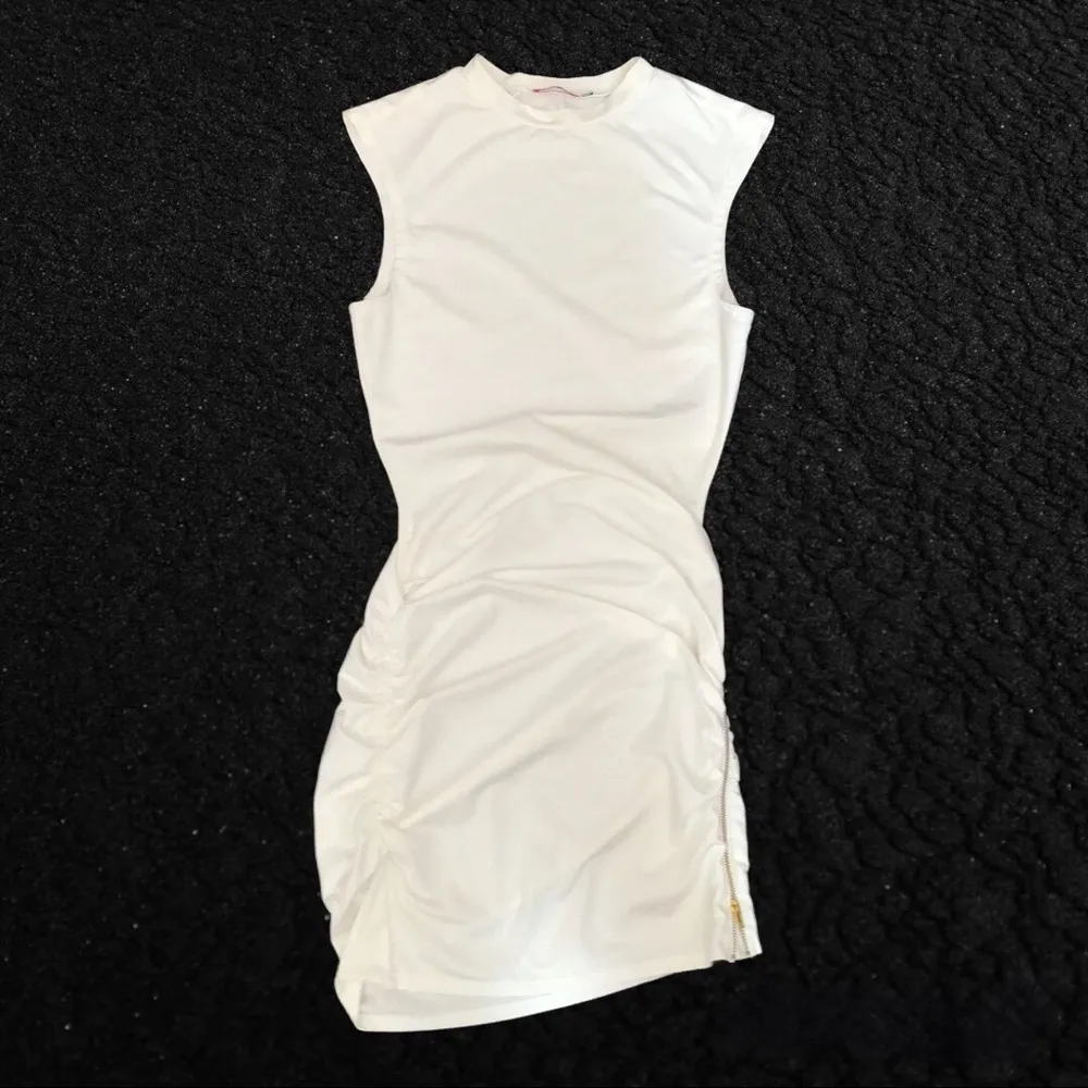 Zipper Slit Dress Size A Reg $64.95. 
A mini dress - Image 2