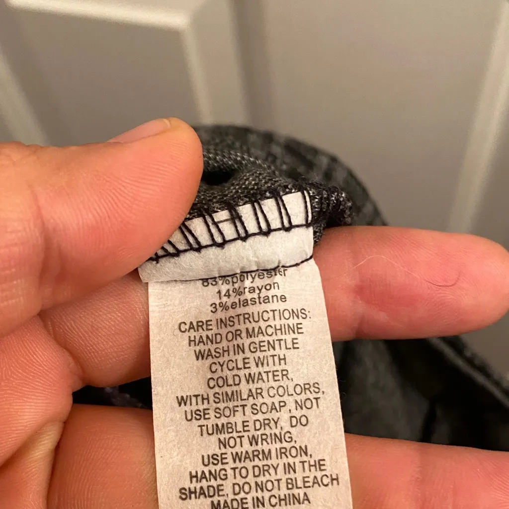 Elegant Black Checkered Mini Skirt with Front Zipper - Image 9