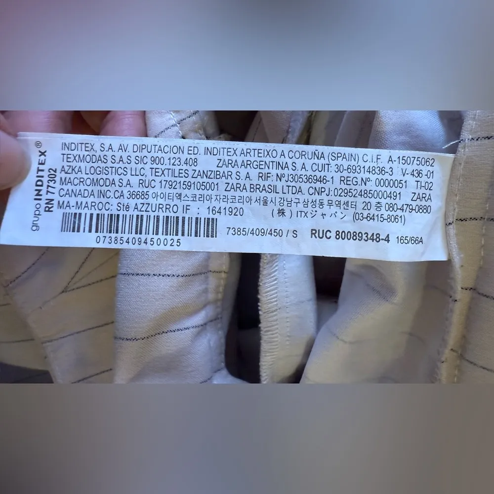 Zara Pleated Skort features a high waist, wrap front, side buckle, pleat details - Image 14