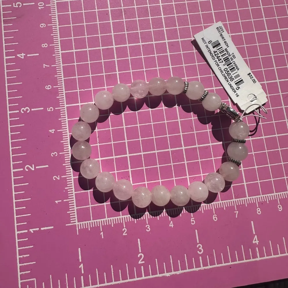 Anne Klein pink jade adjustable bracelet with silver lucky bat - Image 5