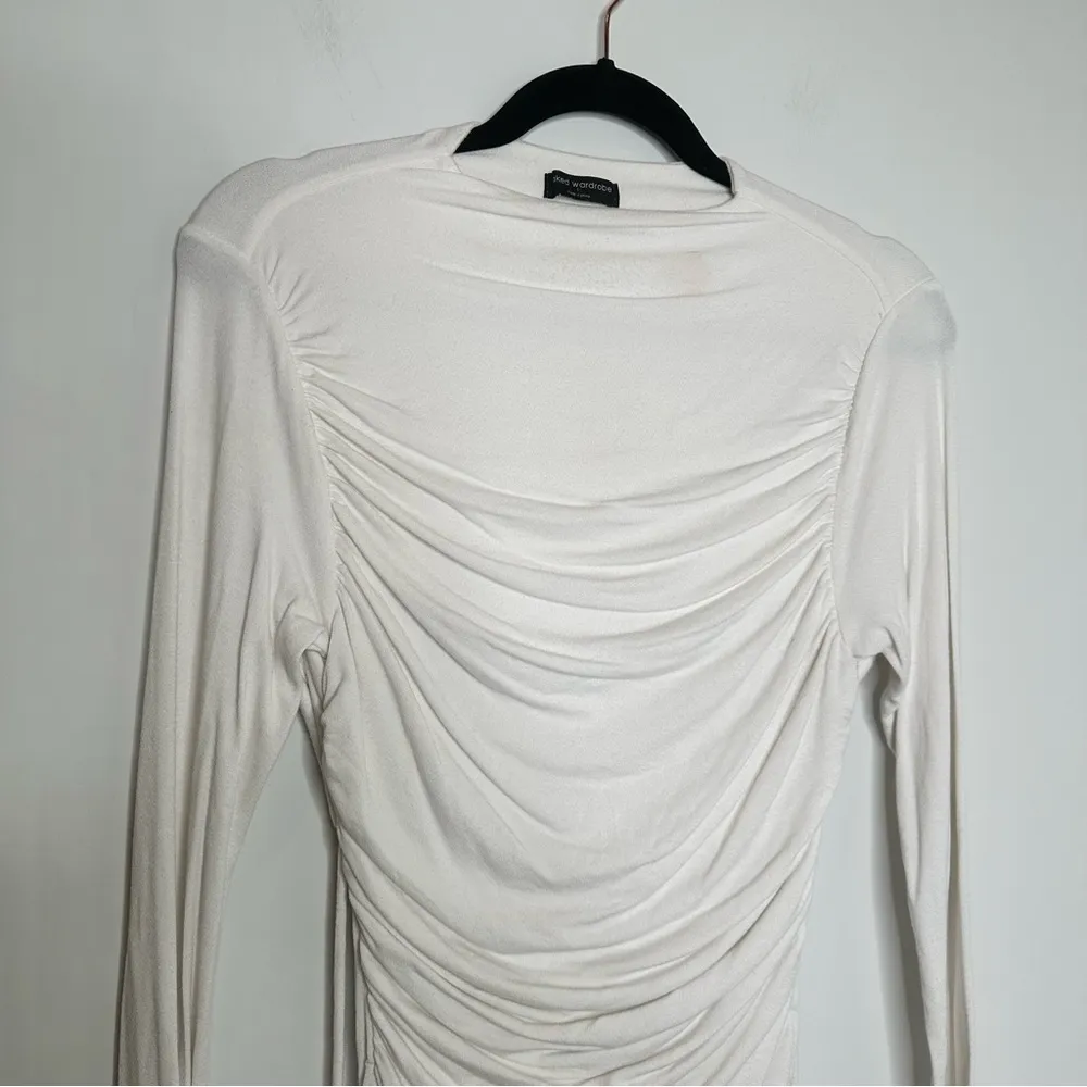 Naked Wardrobe Ruched Long Sleeve Open Back Mini Dress in Cream - Image 5