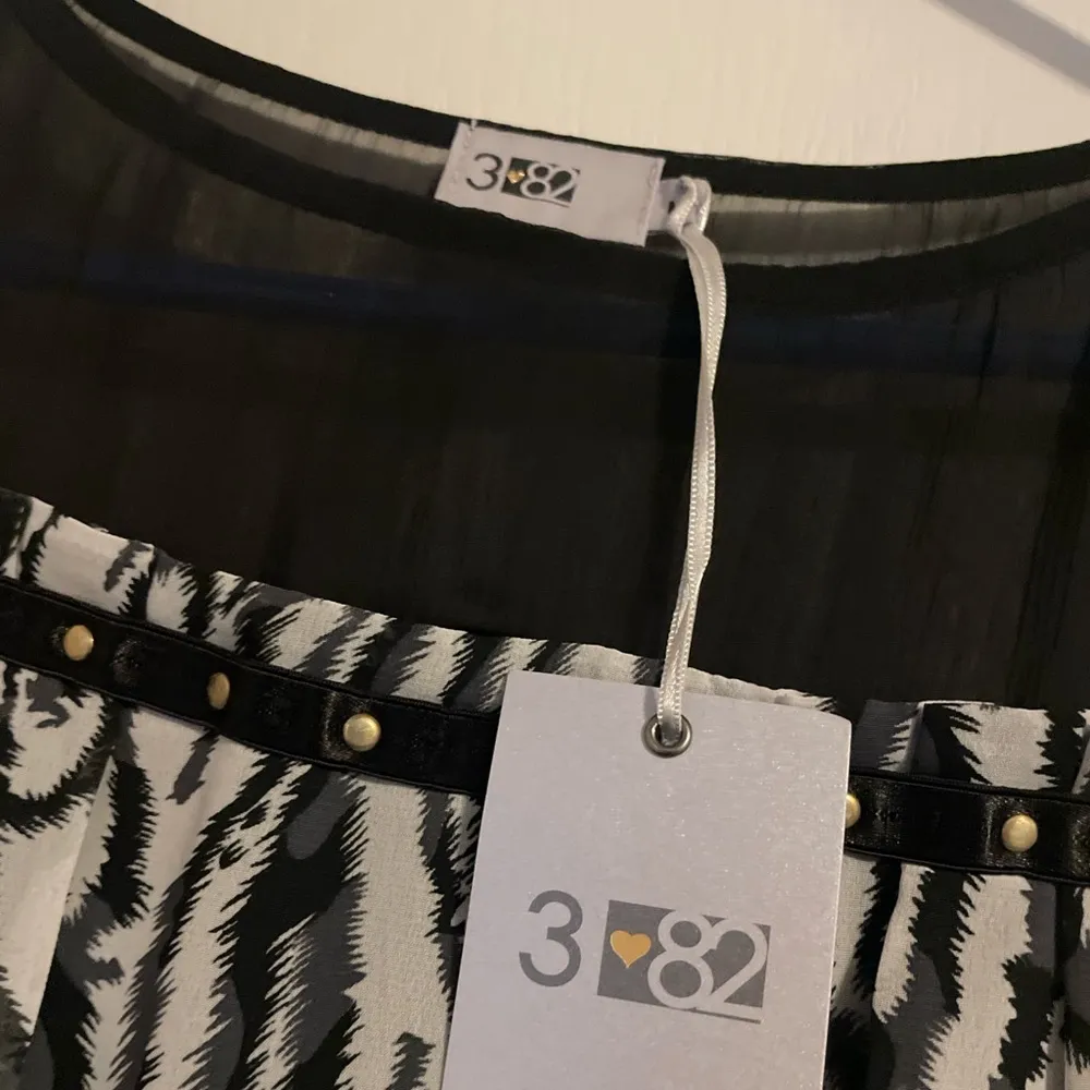 Three Eighty Two NWT  Zebra Print Sleeveless Smocked Mini Dress Size Medium - Image 4