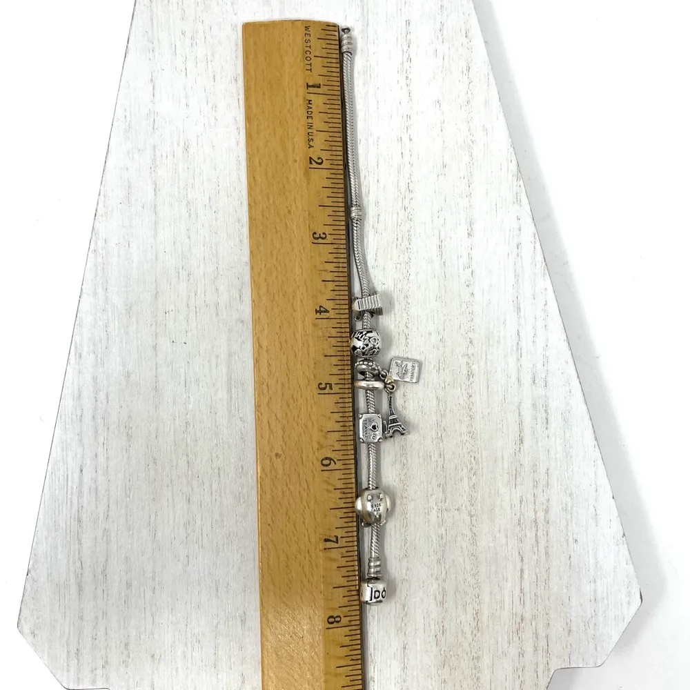 PANDORA  “travel” themed 6 charm sterling silver bracelet - Image 13