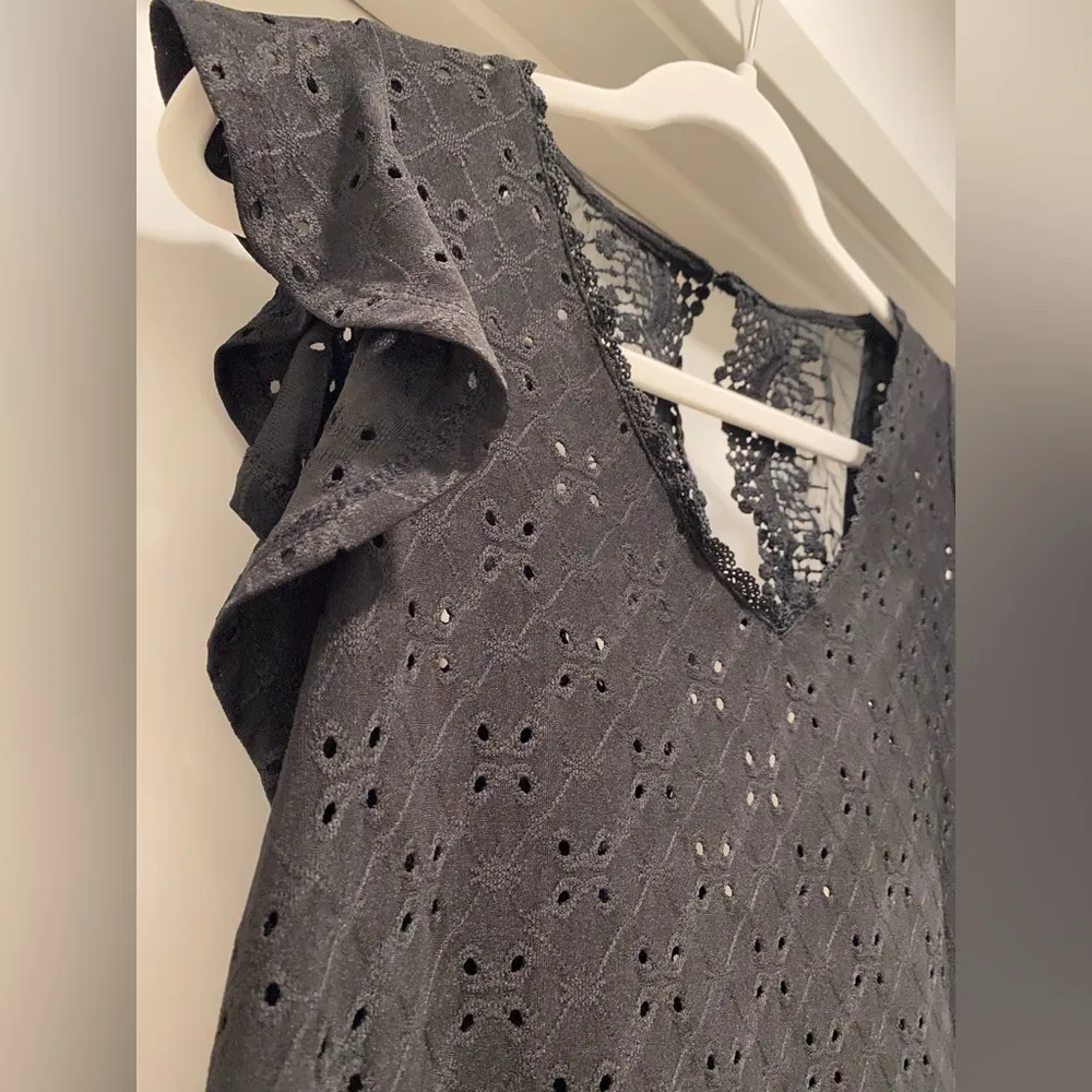 Black Eyelet V-Neck Blouse With Ruffle Short Sleeves & Lace Back Closure - Image 6