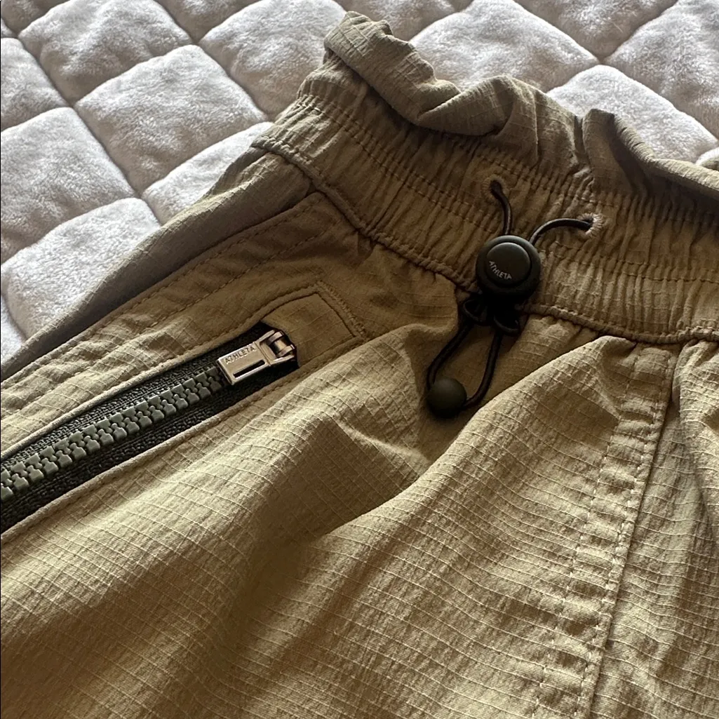 Athleta Trekkie Parachute Shorts green high-rise pull on shorts adjustable waist - Image 5