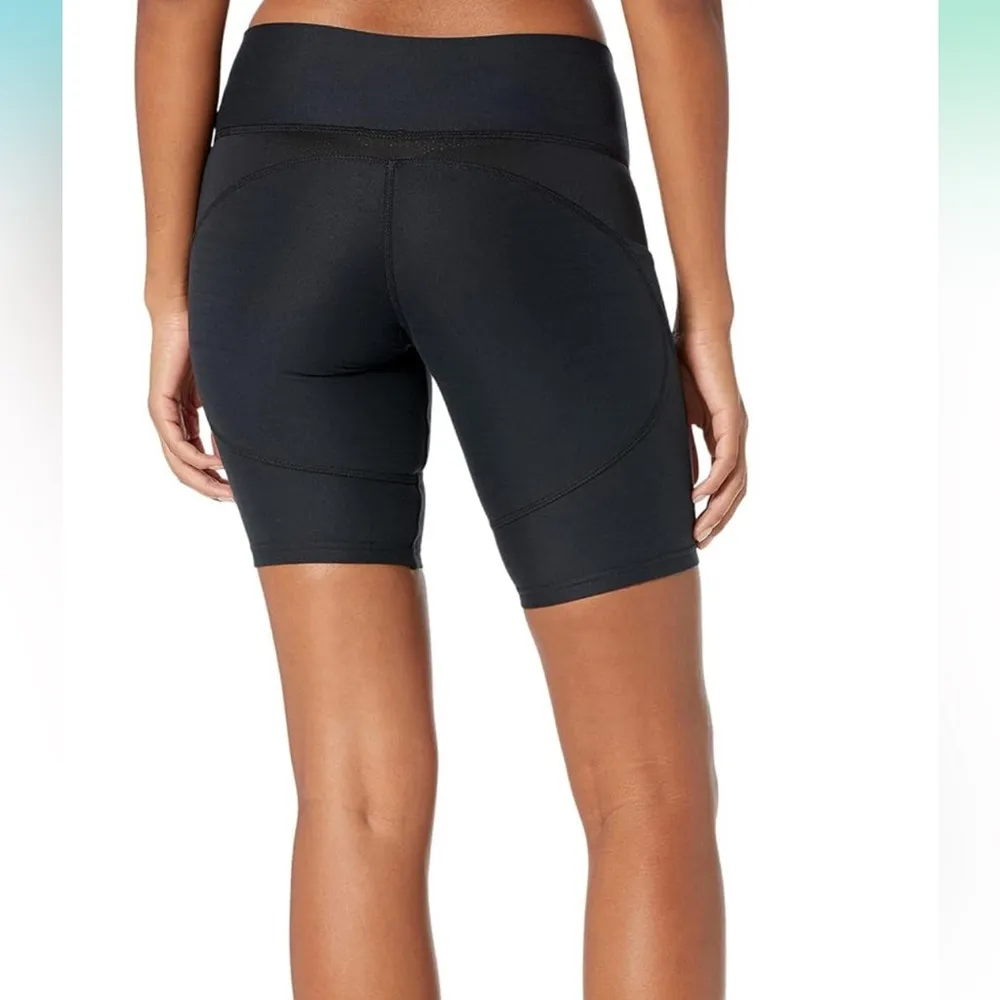 UFC Women's Black Bike Shorts with Red Logo and Side Pockets Size M - Image 5