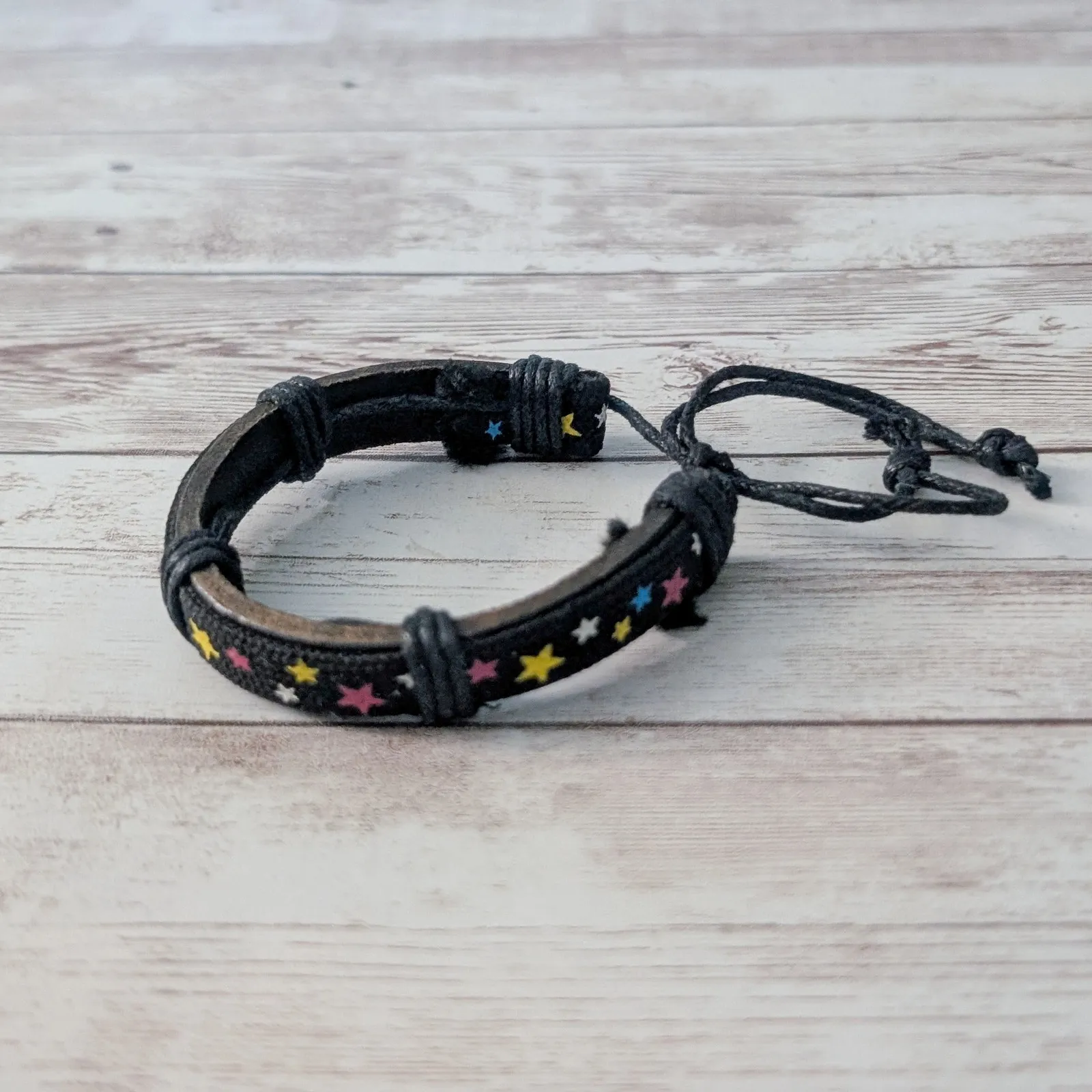 Adjustable Leather Tie Bracelet with Multi Colored Stars Black - Image 6