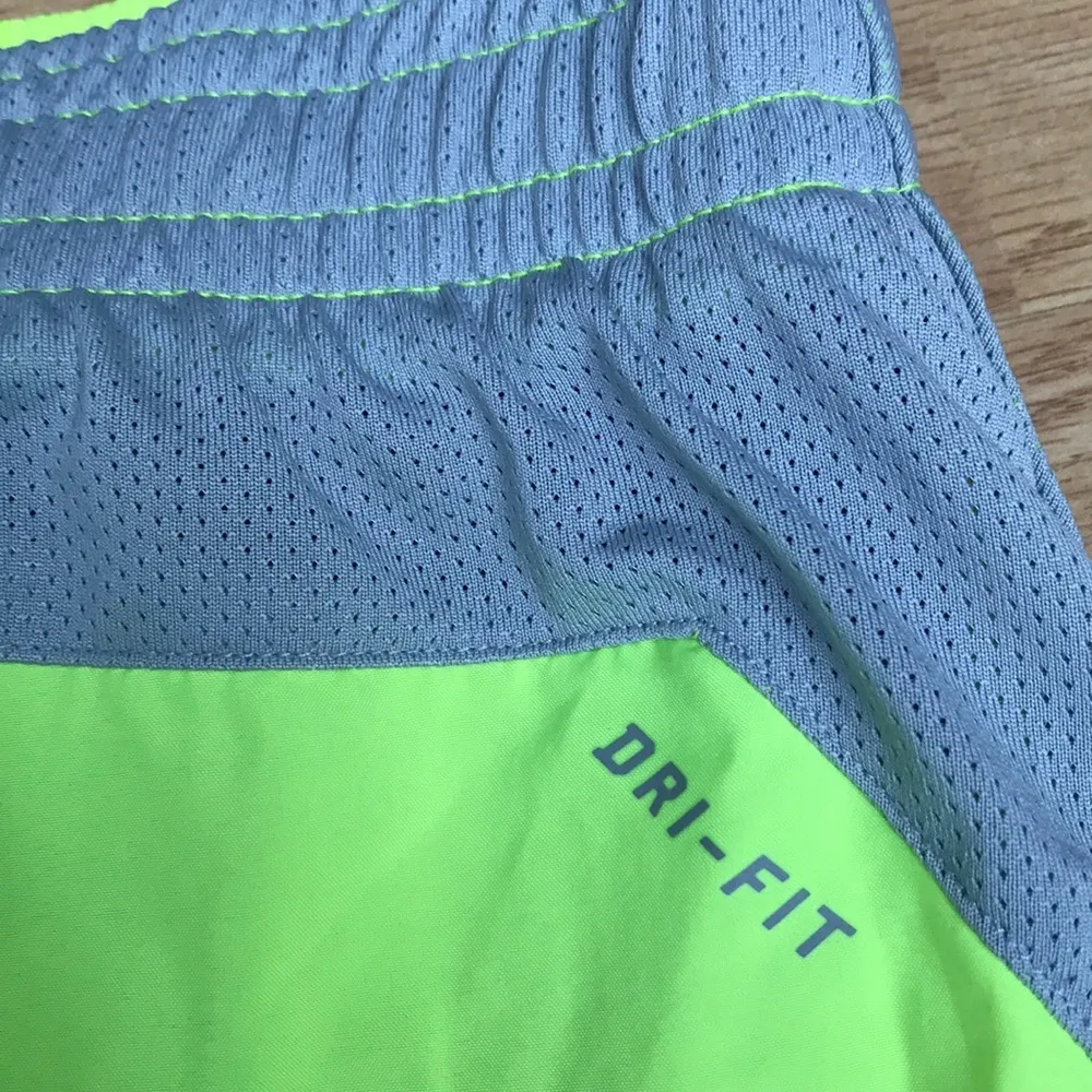 Nike neon yellow running shorts size medium NEW - Image 4