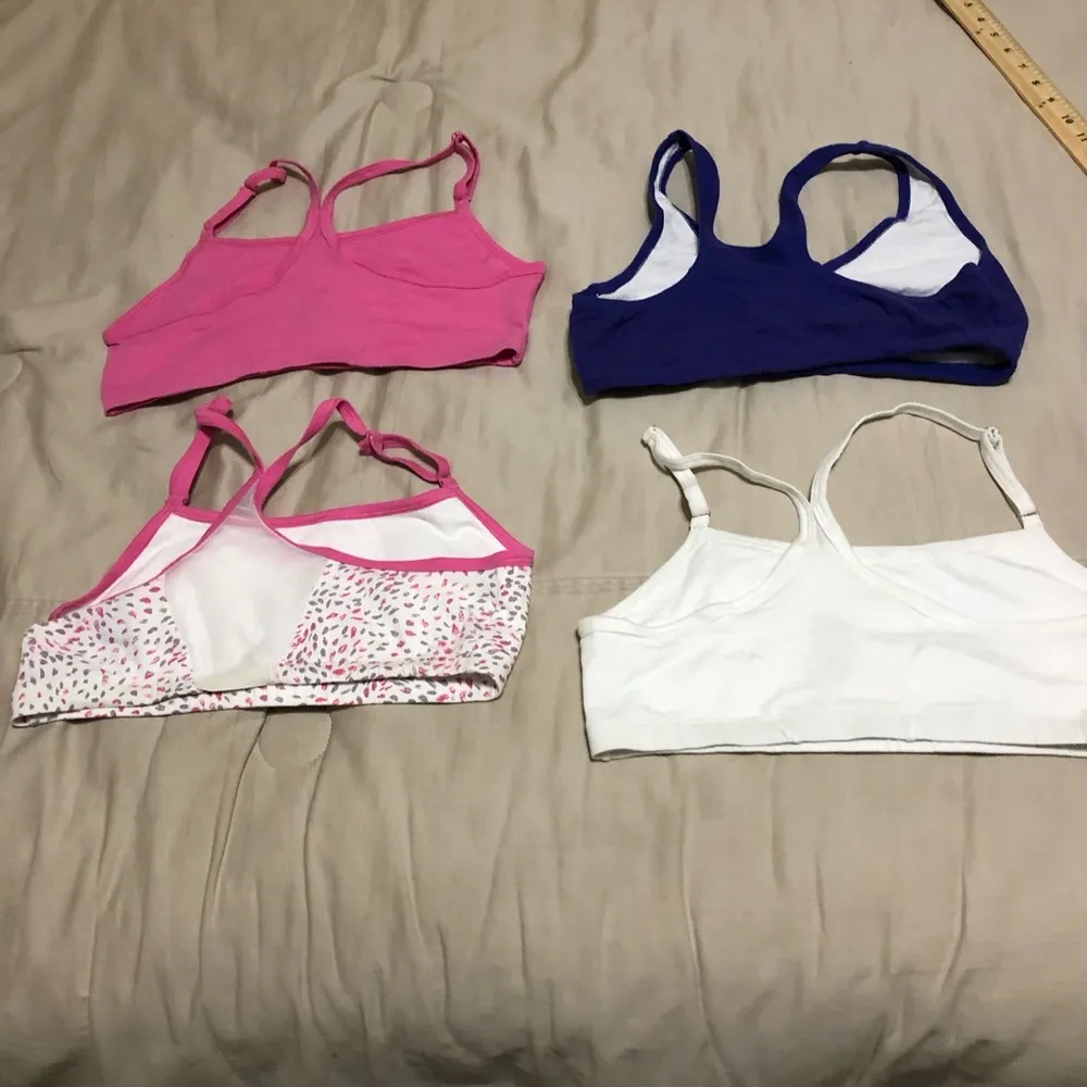 Set of 4 size medium sports bras NWOT - Image 7