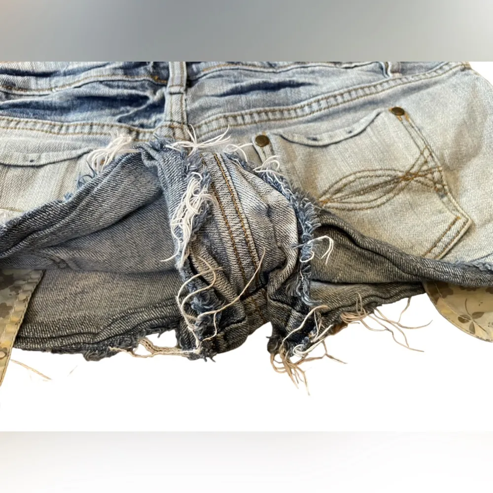 No Boundaries Y2K Deconstructed Raw Hem Fringe Cheeky Micro Mini Denim Shorts - Image 3