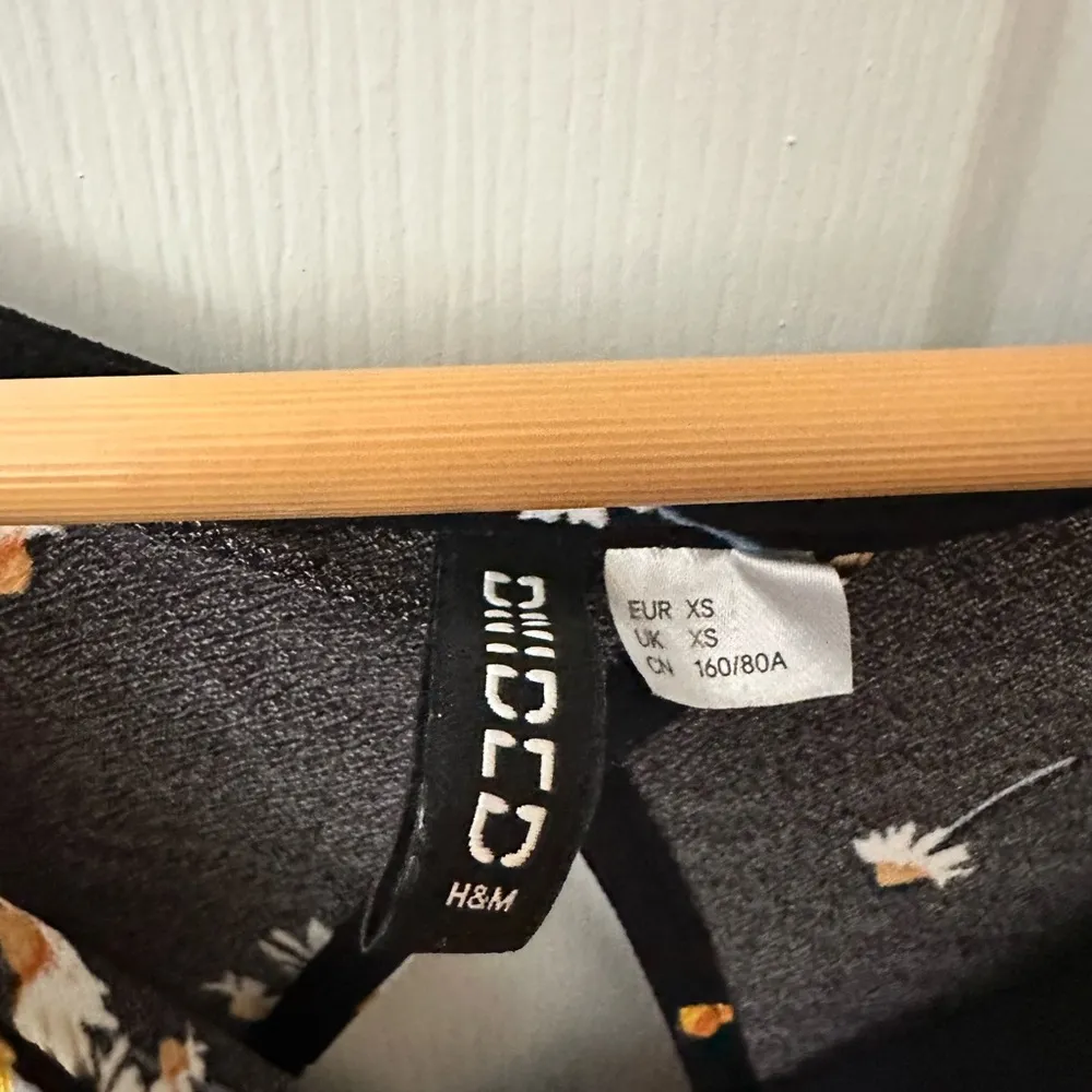 Black and Yellow Floral Wrap Blouse - Image 2